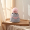 A grey woolen hat paired with a pink woolen heart-shaped pattern warm knitted women's hat details Picture